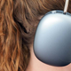 A photo of a person wearing the Apple AirPods Max